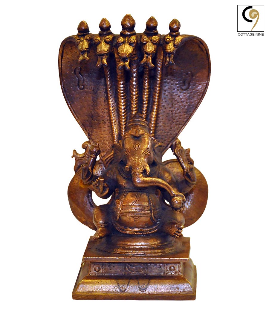 Ganapati-Sitting-Shaded-By-Vasuki-South-Indian-Copper-Idol