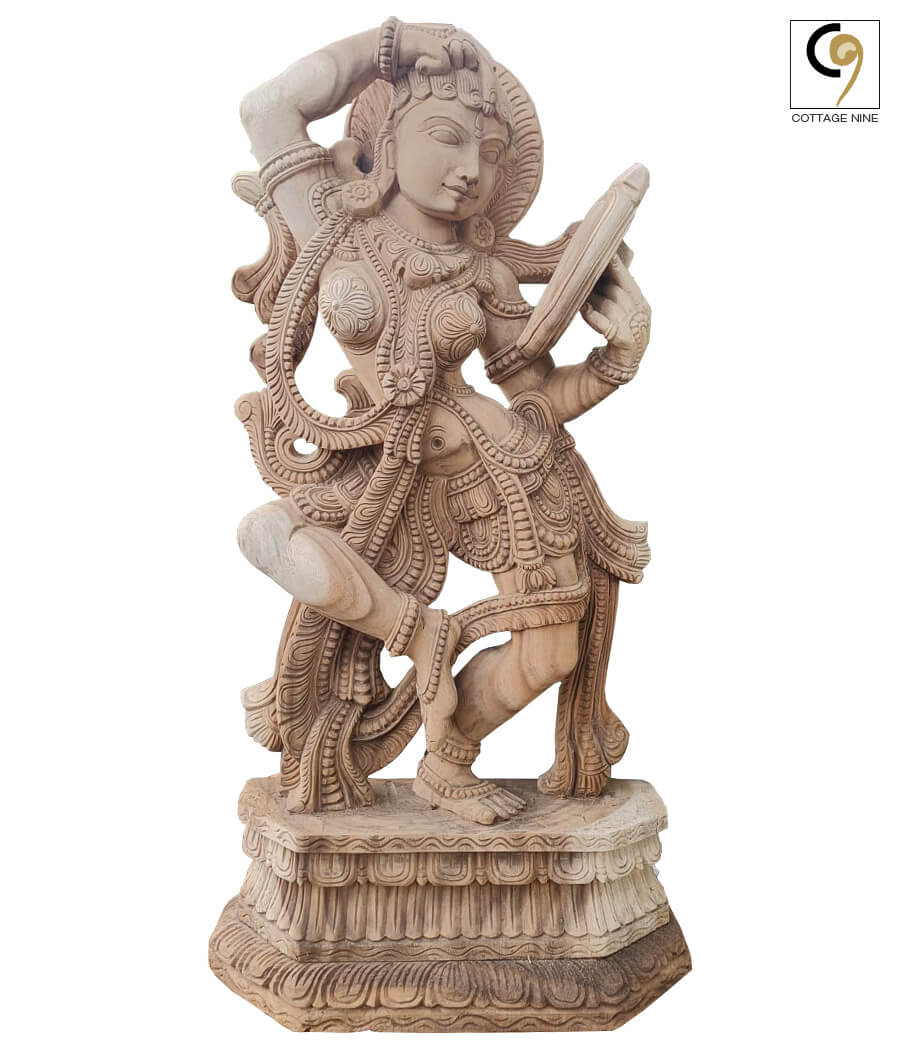 A-Fine-Woodcarving-of-an-Apsara-Admiring-her-in-a-Mirror